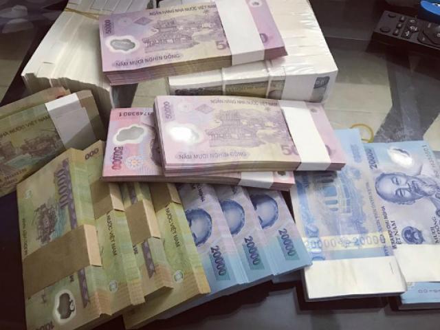 Đổi tiền lẻ dịp Tết Nguyên đán kiếm lời bị phạt bao nhiêu?